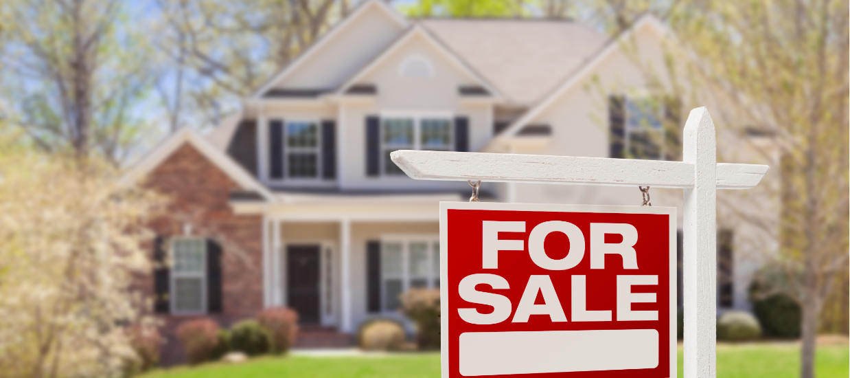 house with for sale sign