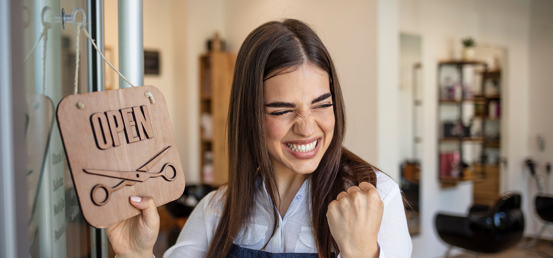 Happy Business Owner Opening Doors