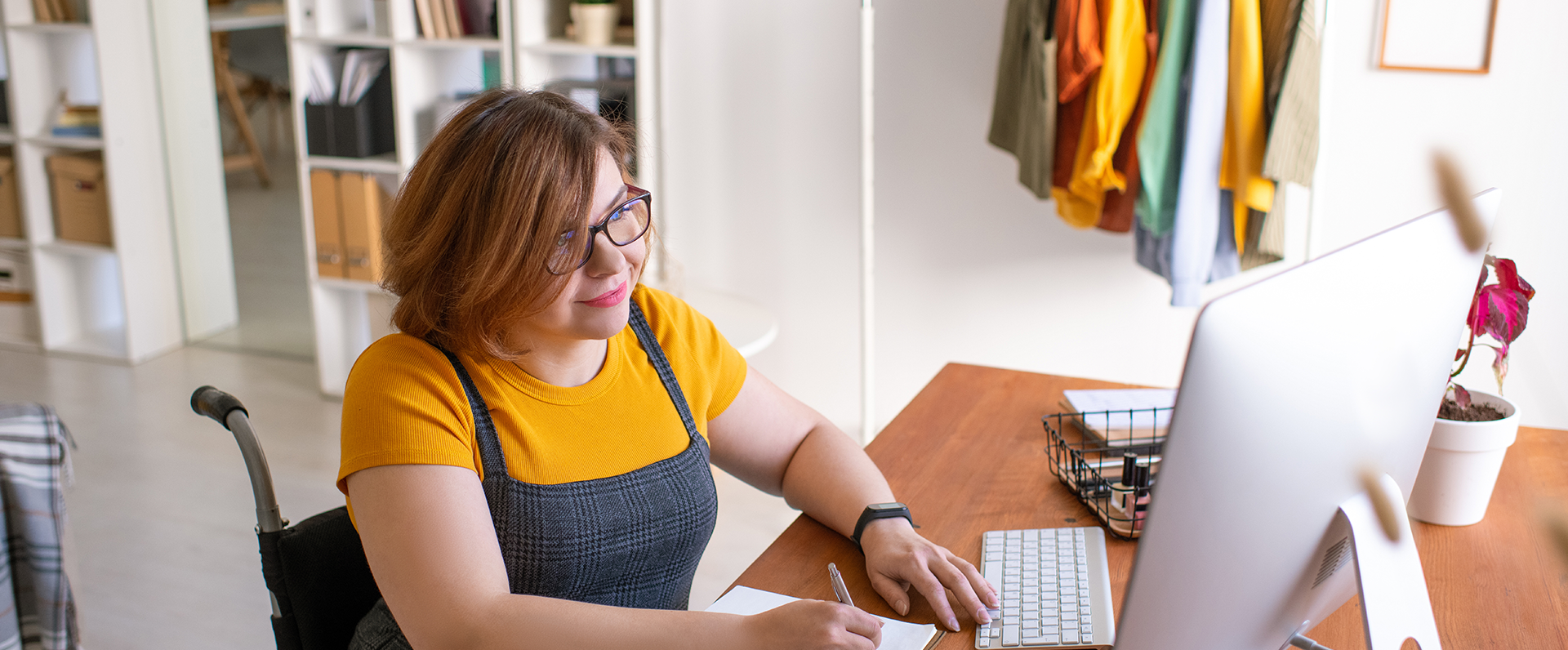 Woman Banking Online at Desk